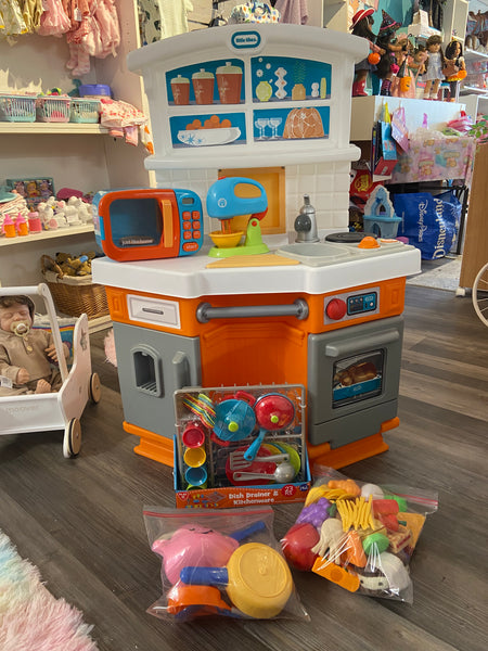 Little Tikes Kitchen Set.  Doesn’t make sounds