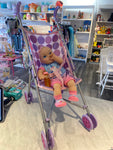 Stroller w/doll & magic bottle